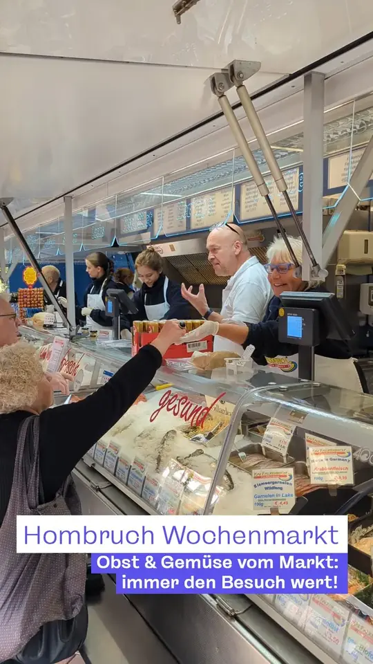 Cover: Marktstand in Hombruch mit Kundschaft, dazu „Hombruch Wochenmarkt – Obst & Gemüse vom Markt: immer den Besuch wert!“.